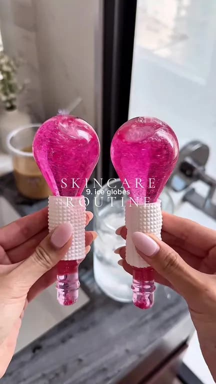 Pink ice globes in a skincare video with the on-screen text Skincare routine, 9. ice globes